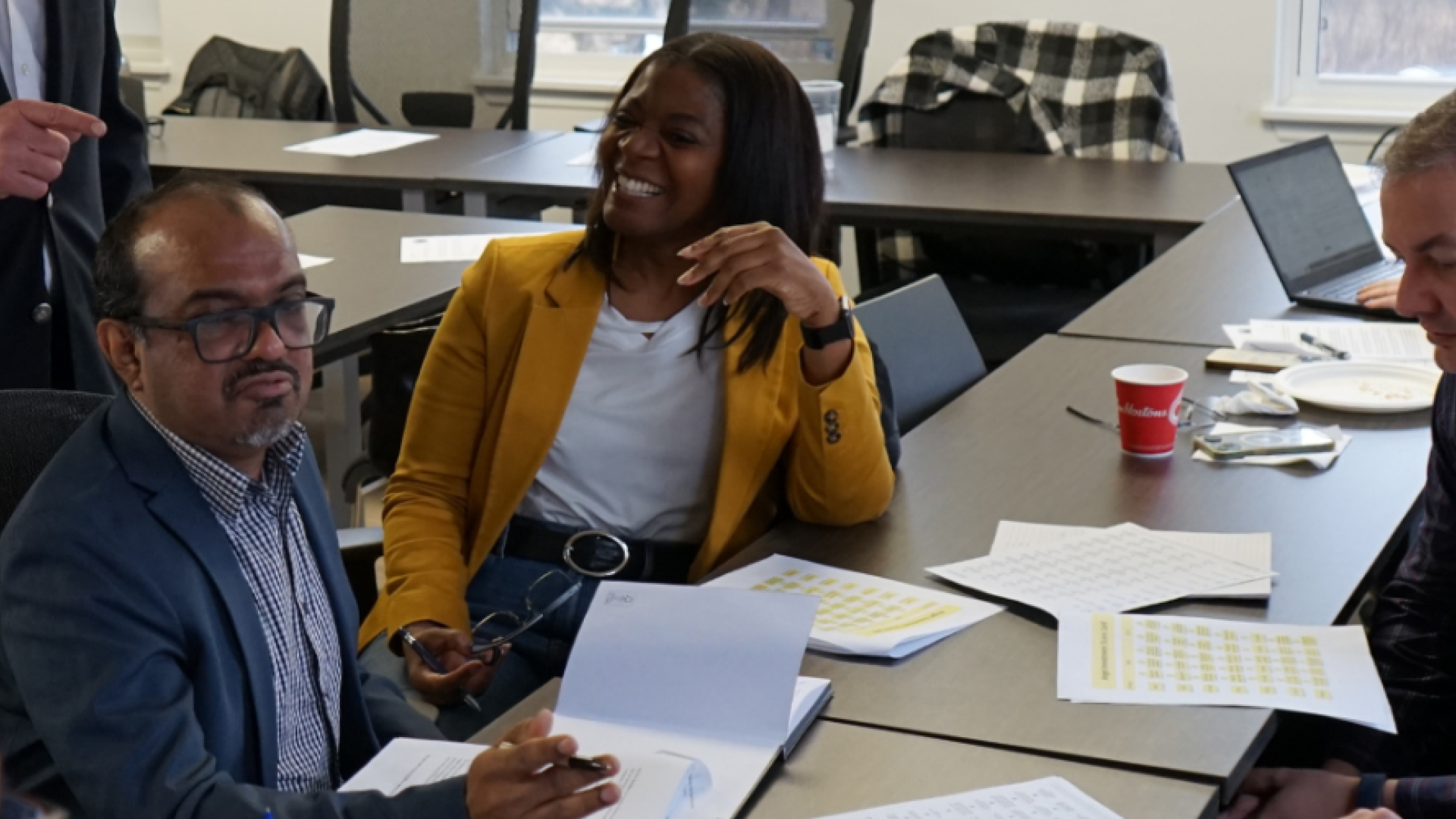 : A group of local entrepreneurs from a previous DMZ Innisfil program gather at the DMZ Innisfil offices in Stroud
