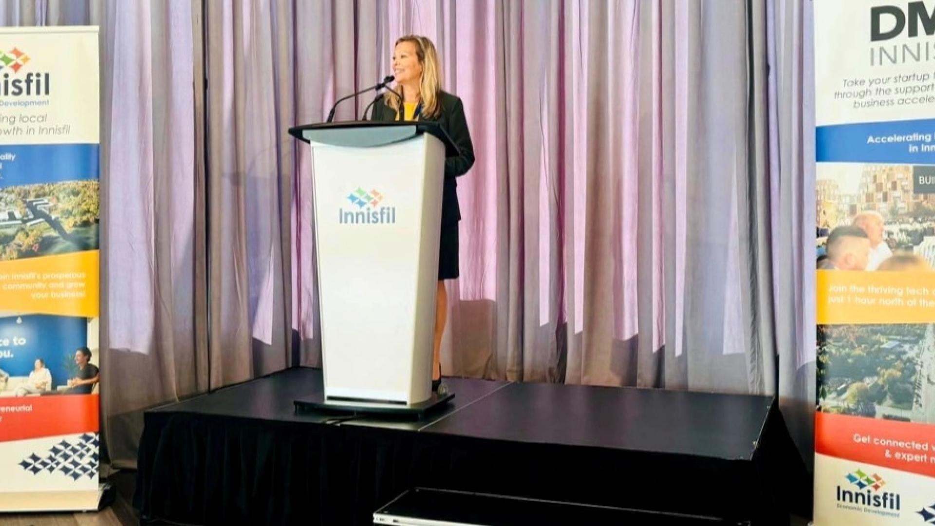 Mayor Dollin standing at event