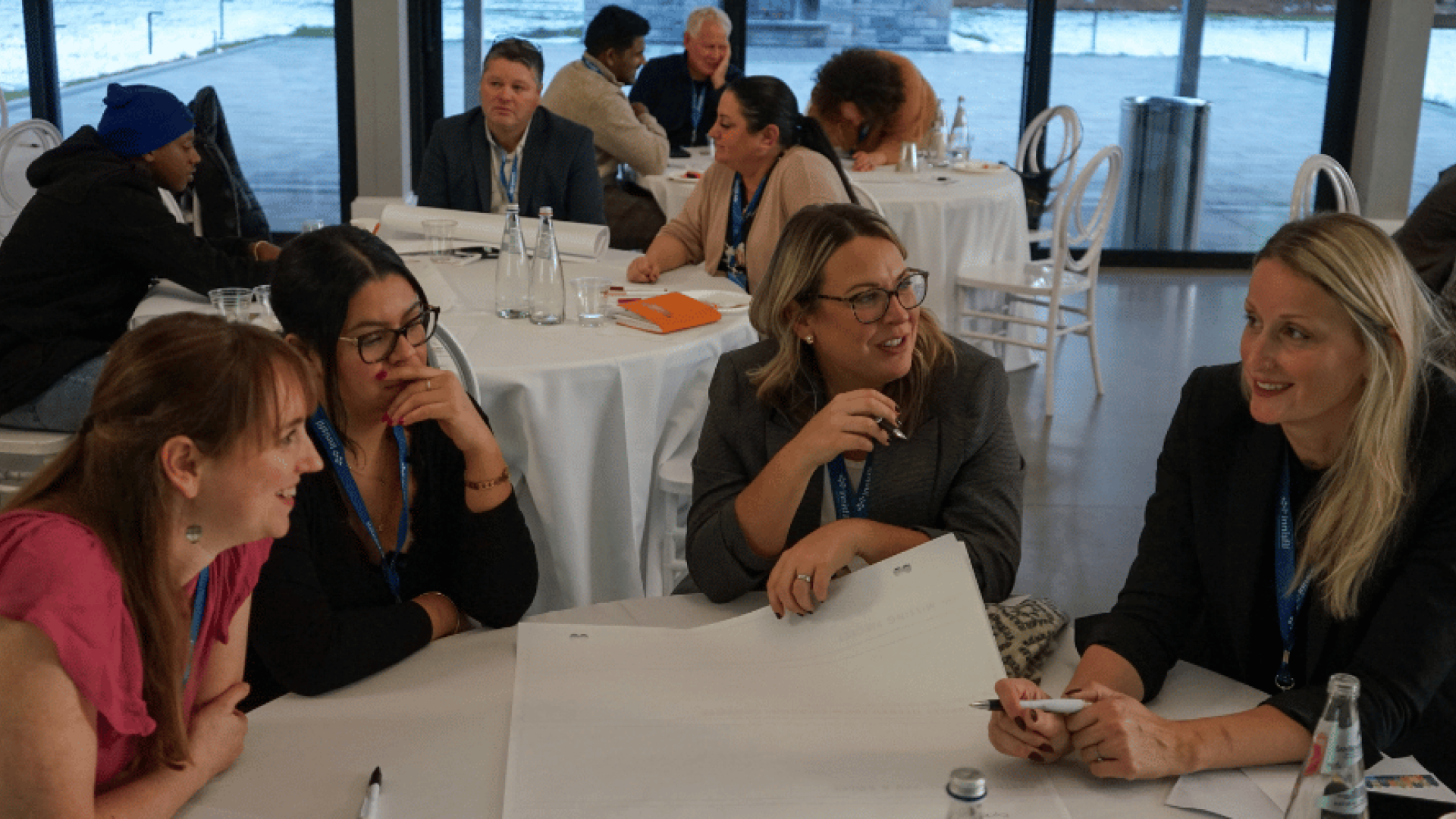 Group of local founders at the recent Innisfil Tourism Summit event working together to brainstorm ideas of new tourism experiences in the area