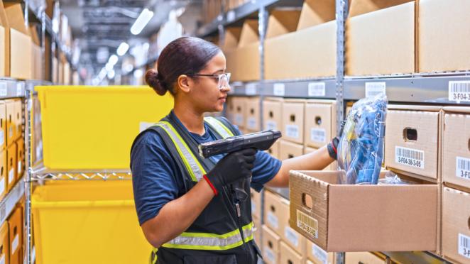 DSV warehouse worker scanning an item