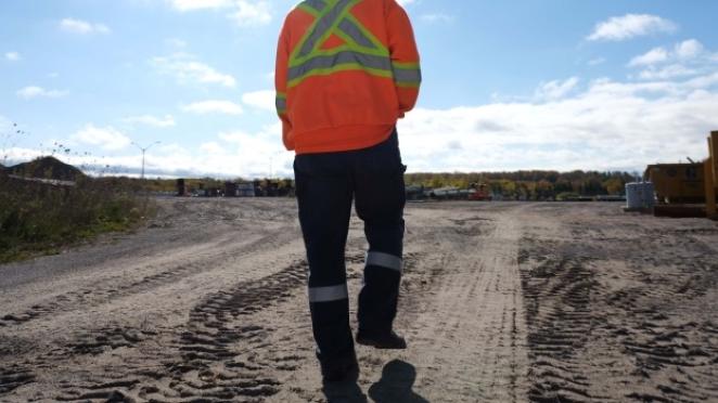 Man walking through new development site