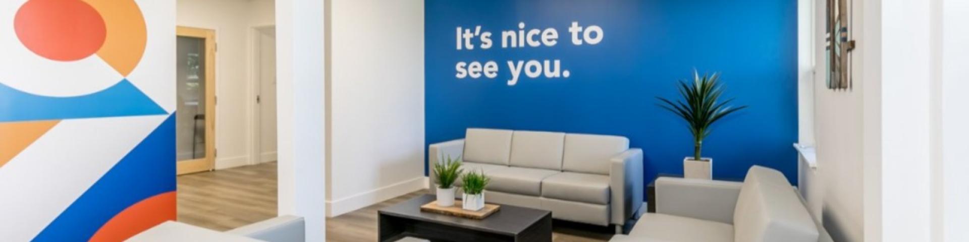 Meeting room in DMZ Innisfil office with couches around table