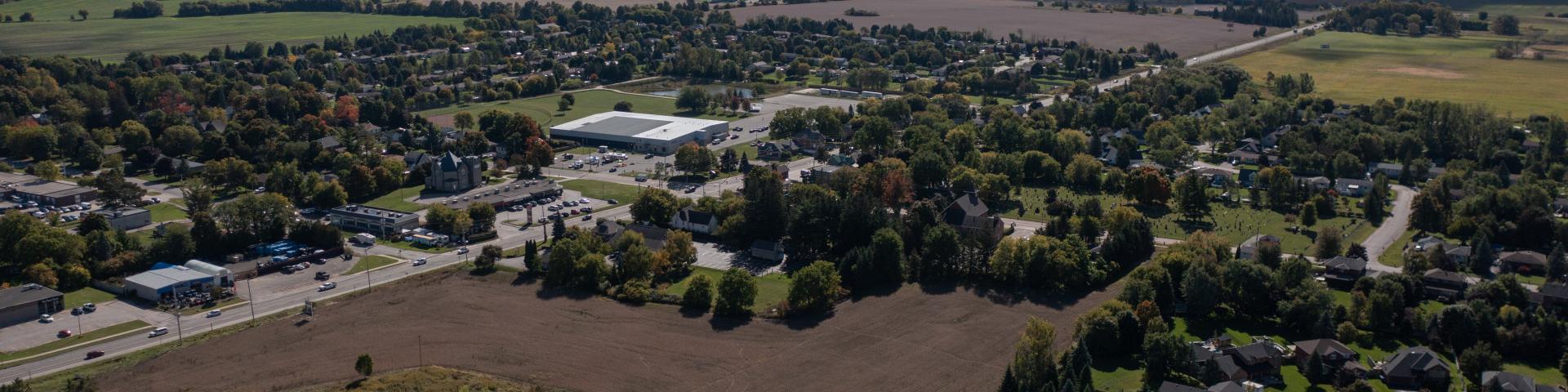 Aerial view of Yonge Street with farm fields and businesses