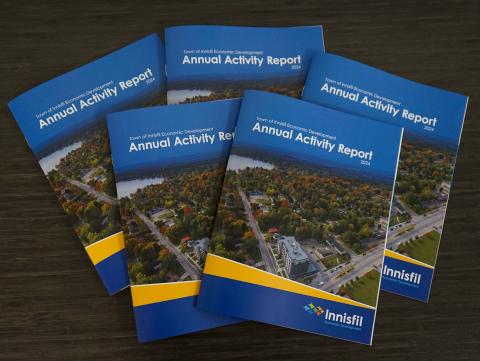 Image of the 2024 Annual Activity Report booklets on a table